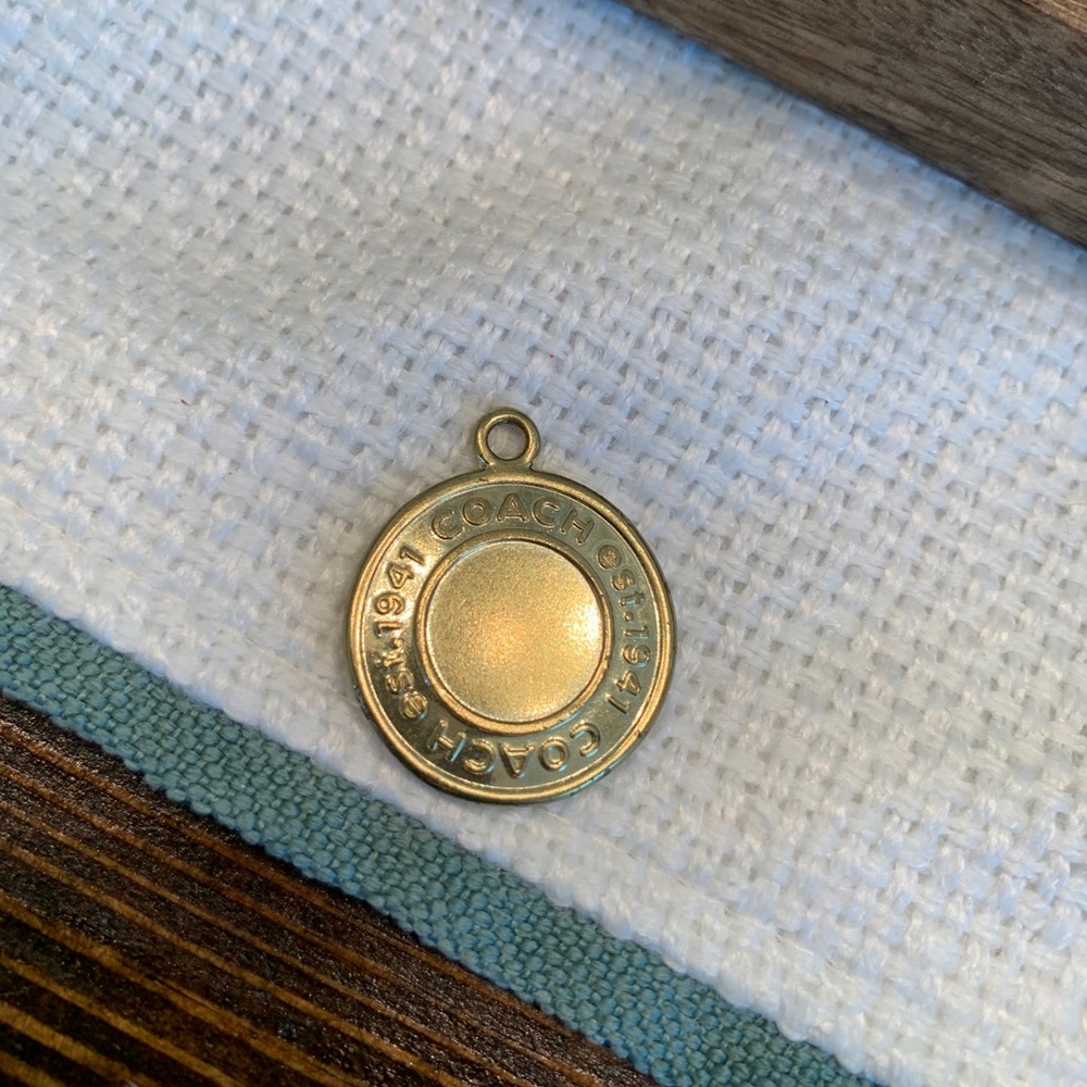 Gold coach pendant